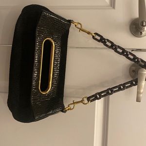 Limited edition Louis Vuitton clutch or can also be as shoulder bag with chain